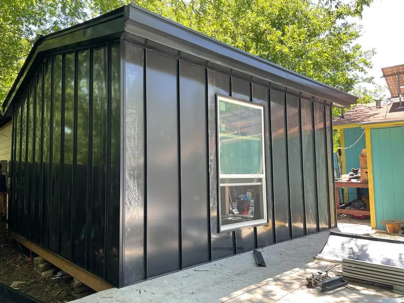 Black standing seam metal wall panels for Roof Inspection in Palmetto